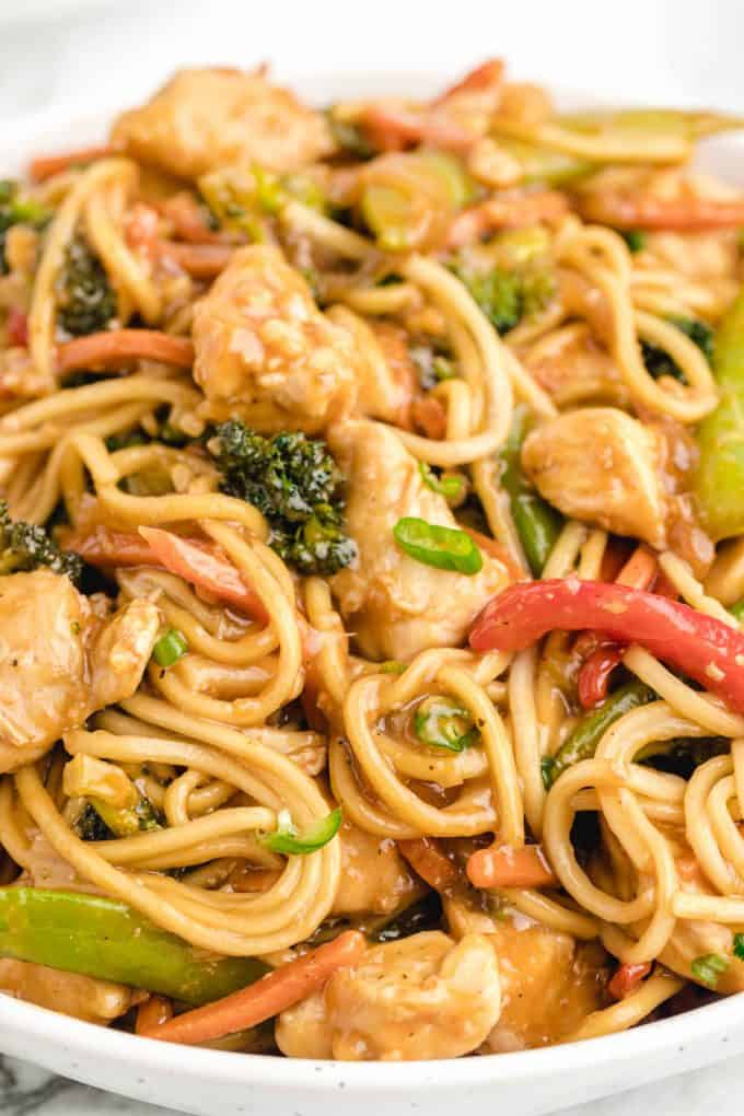 close up of Chicken Lo Mein noodles with chicken and veggies