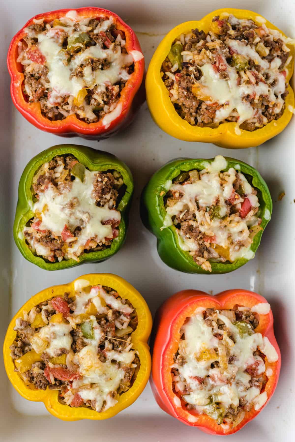 peppers stuffed in a white dish
