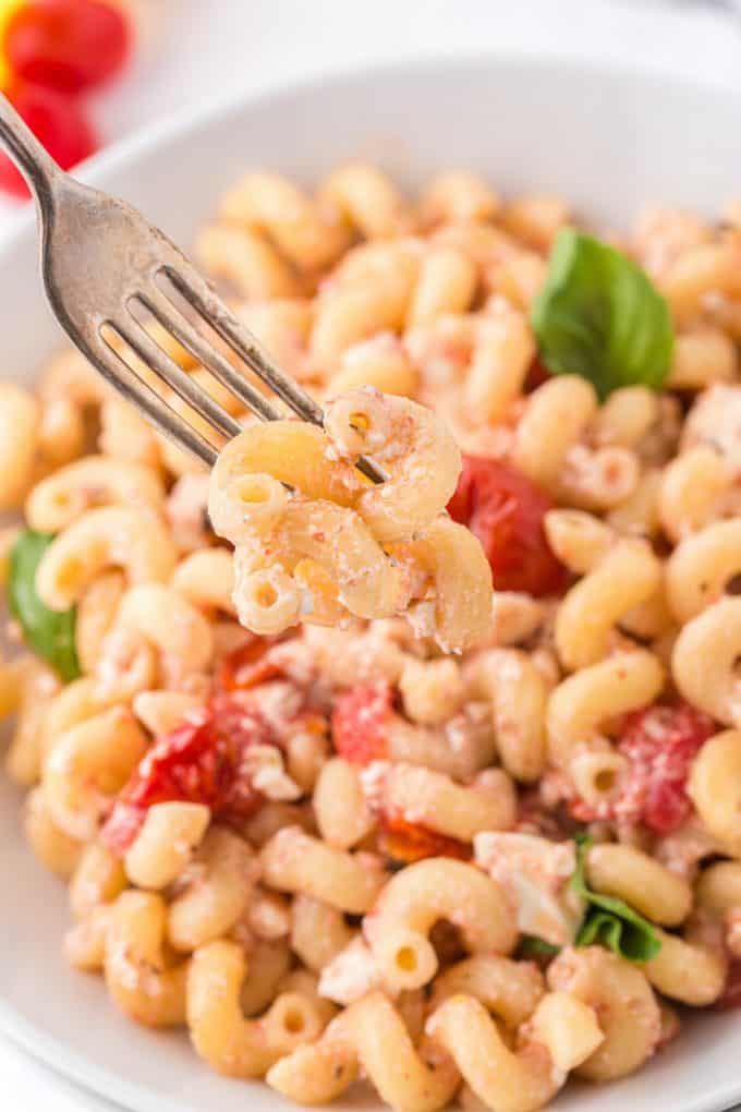 baked feta pasta in a bowl with fork