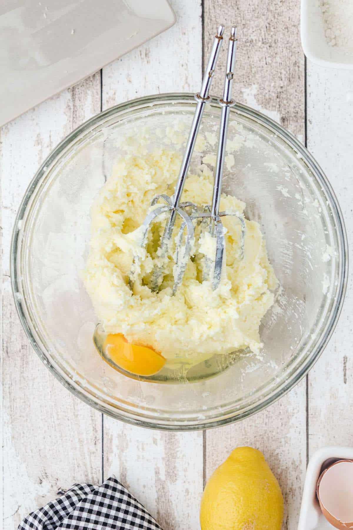mixing butter, sugar and egg together