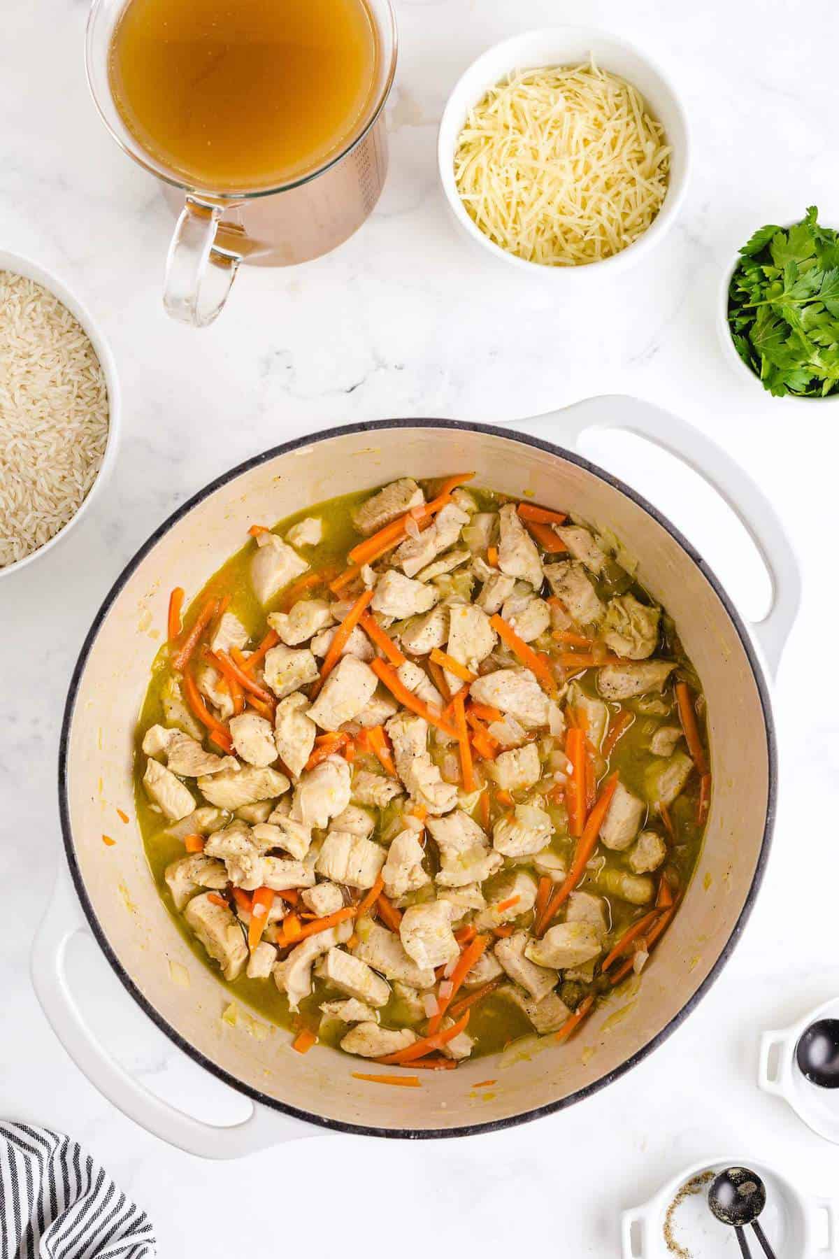 adding white wine to the mixture