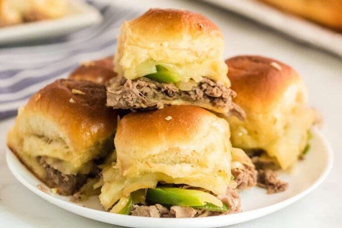 philly cheesesteak slides stacked on plate