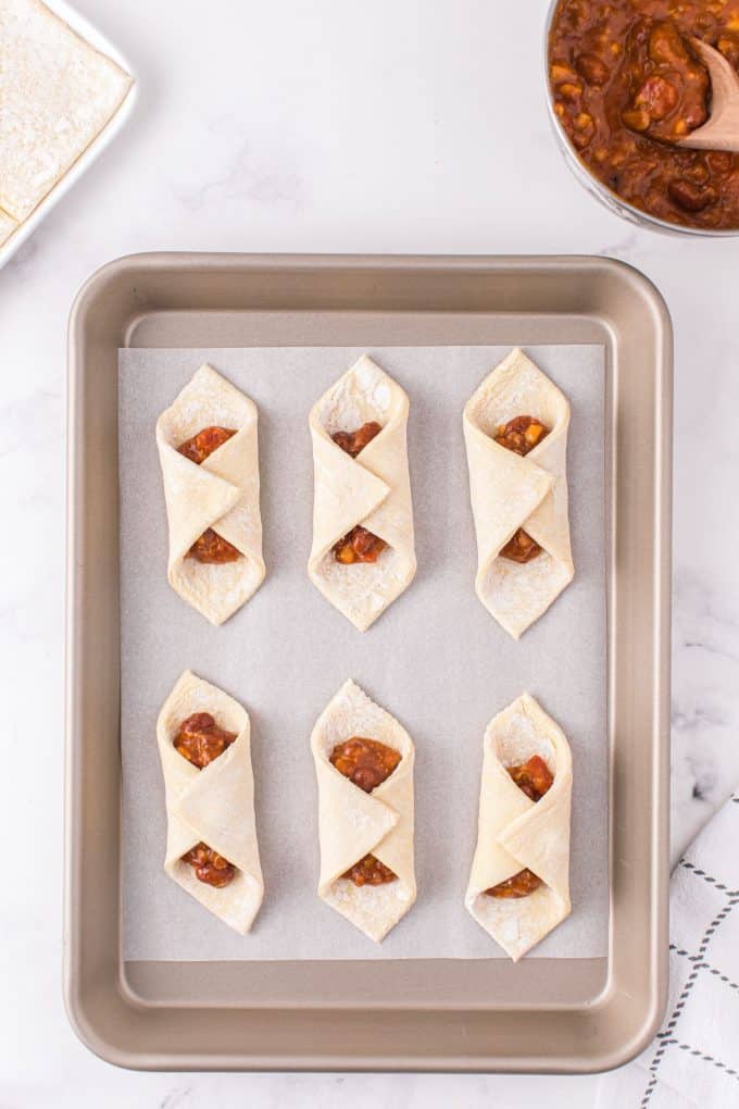 folded puff pastry in a baking sheet