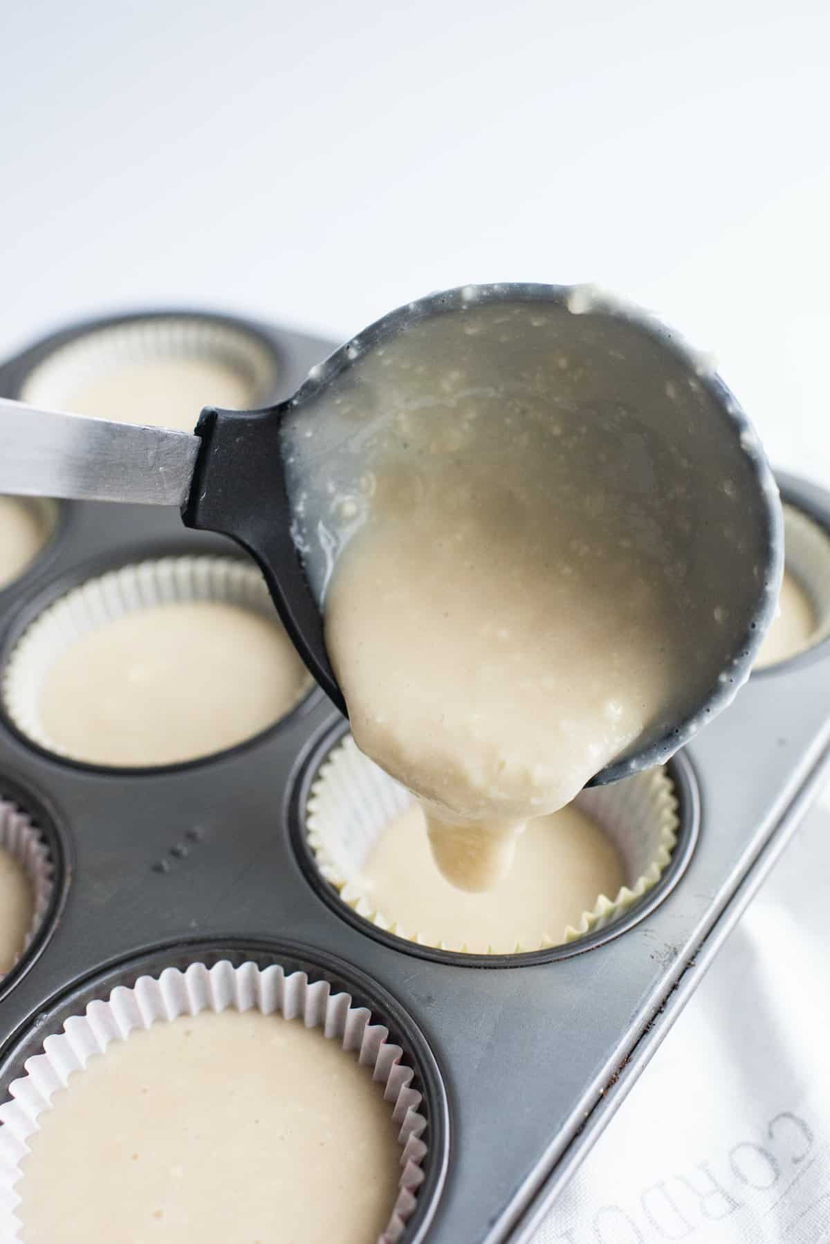 Scoop cake batter into cupcake tin