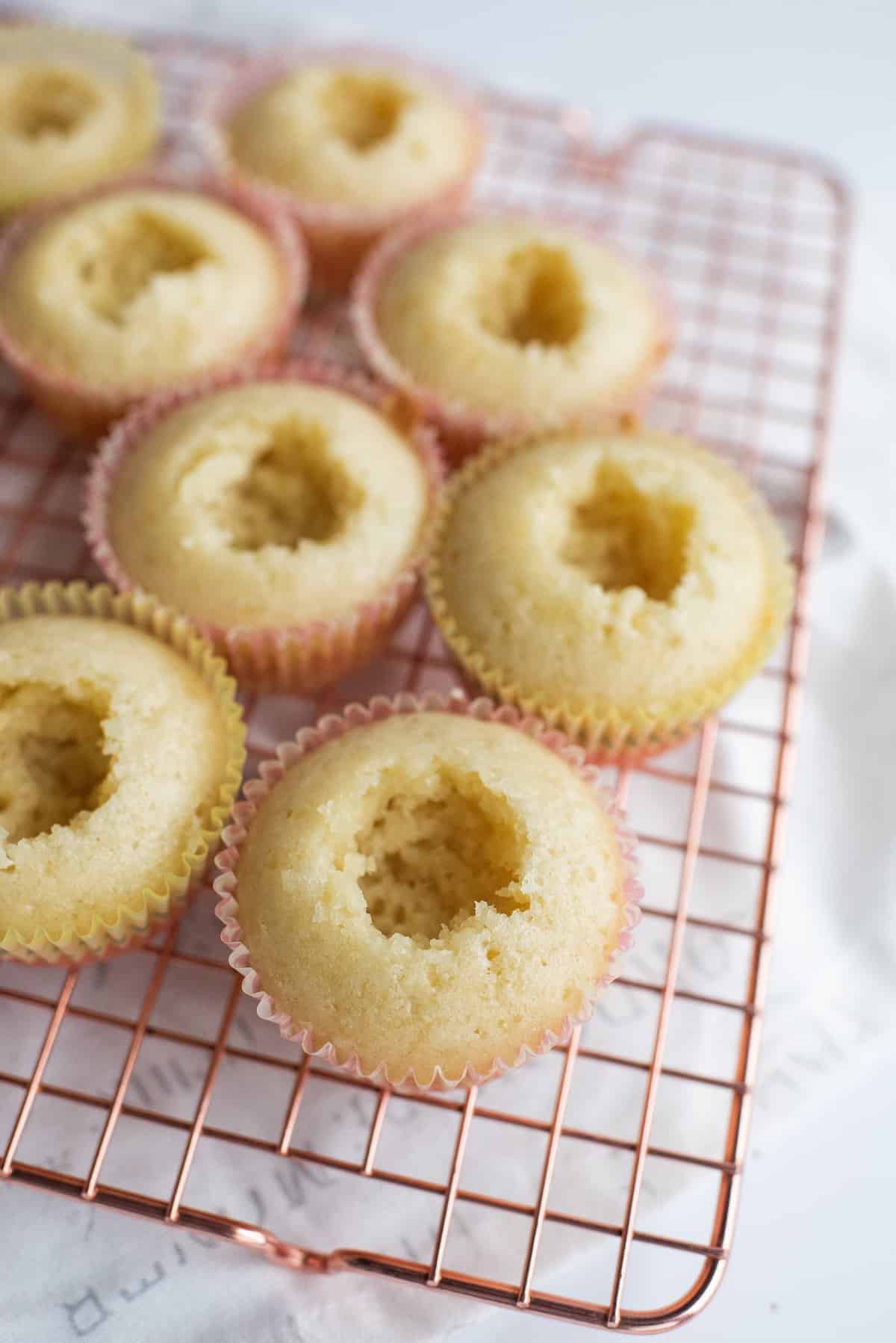 scoop out a hole in the middle of each cupcake