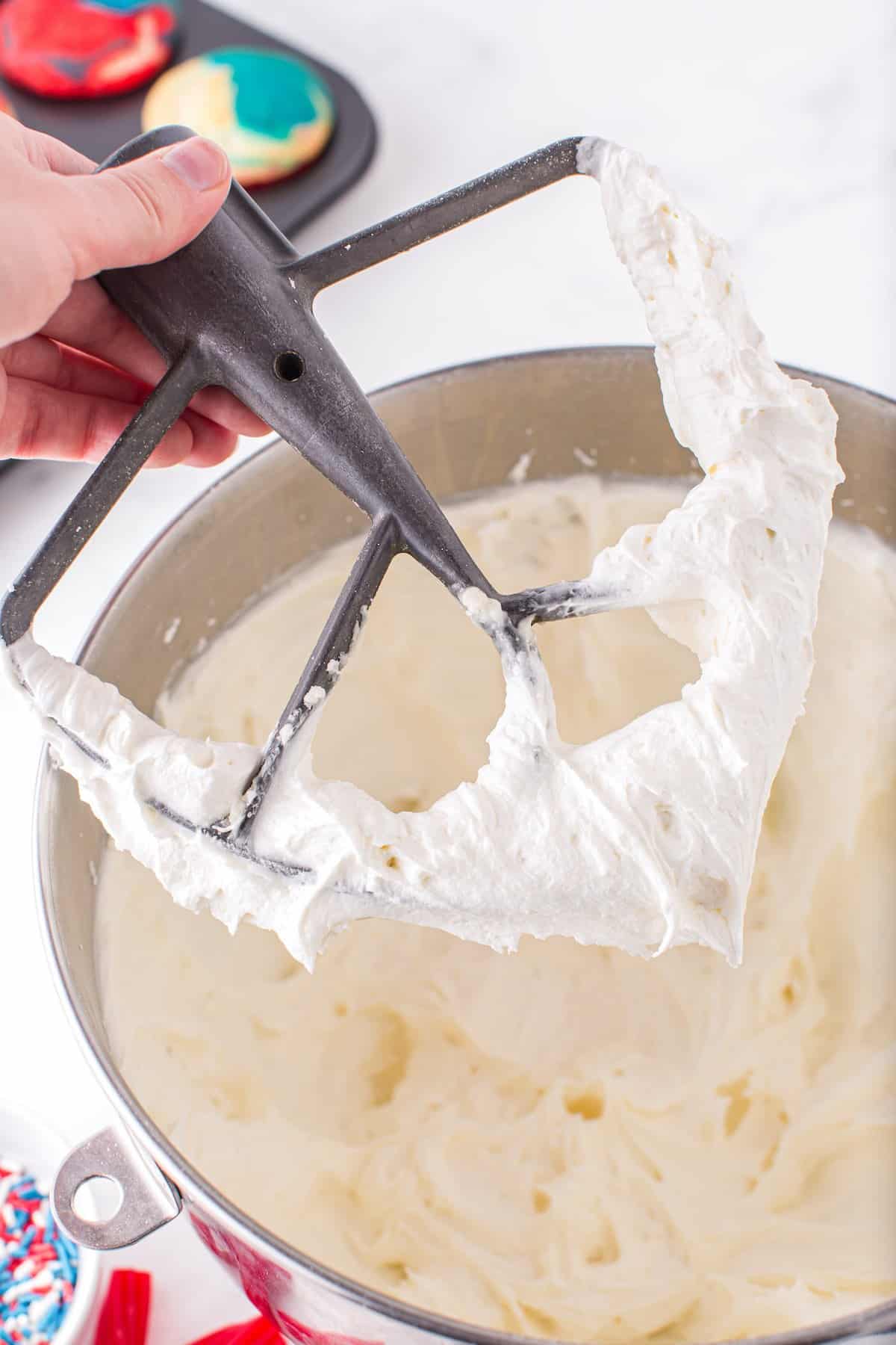 frosting cream in a mixing bowl