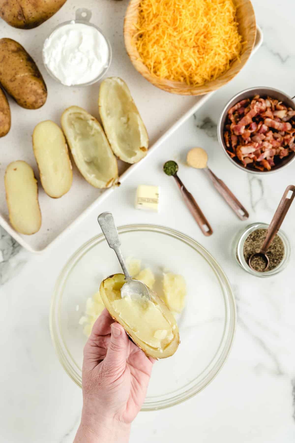 Spoon out most of the inside of the potato