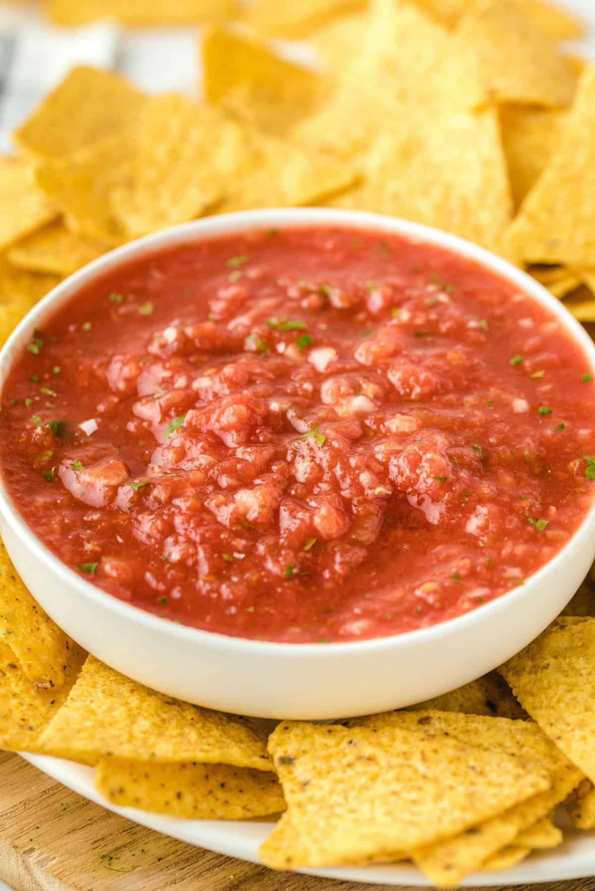 salsa in the bowl placed in the middle of tortilla chips