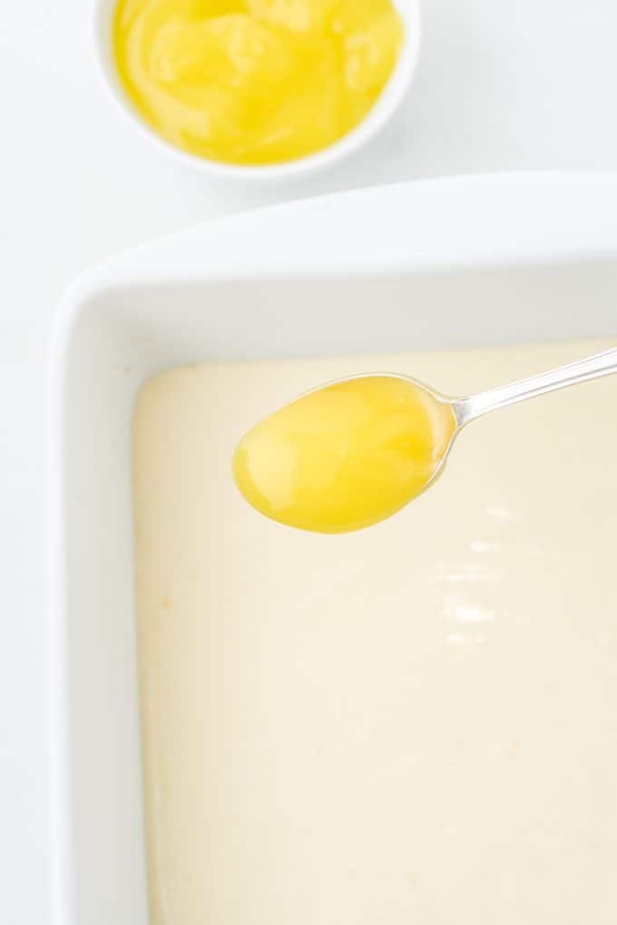 Drop the lemon curd by teaspoon on top of the filling