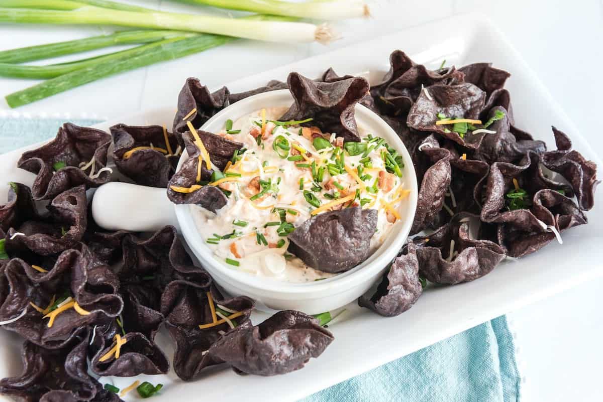 ranch crack dip served in a bowl with tortilla chips