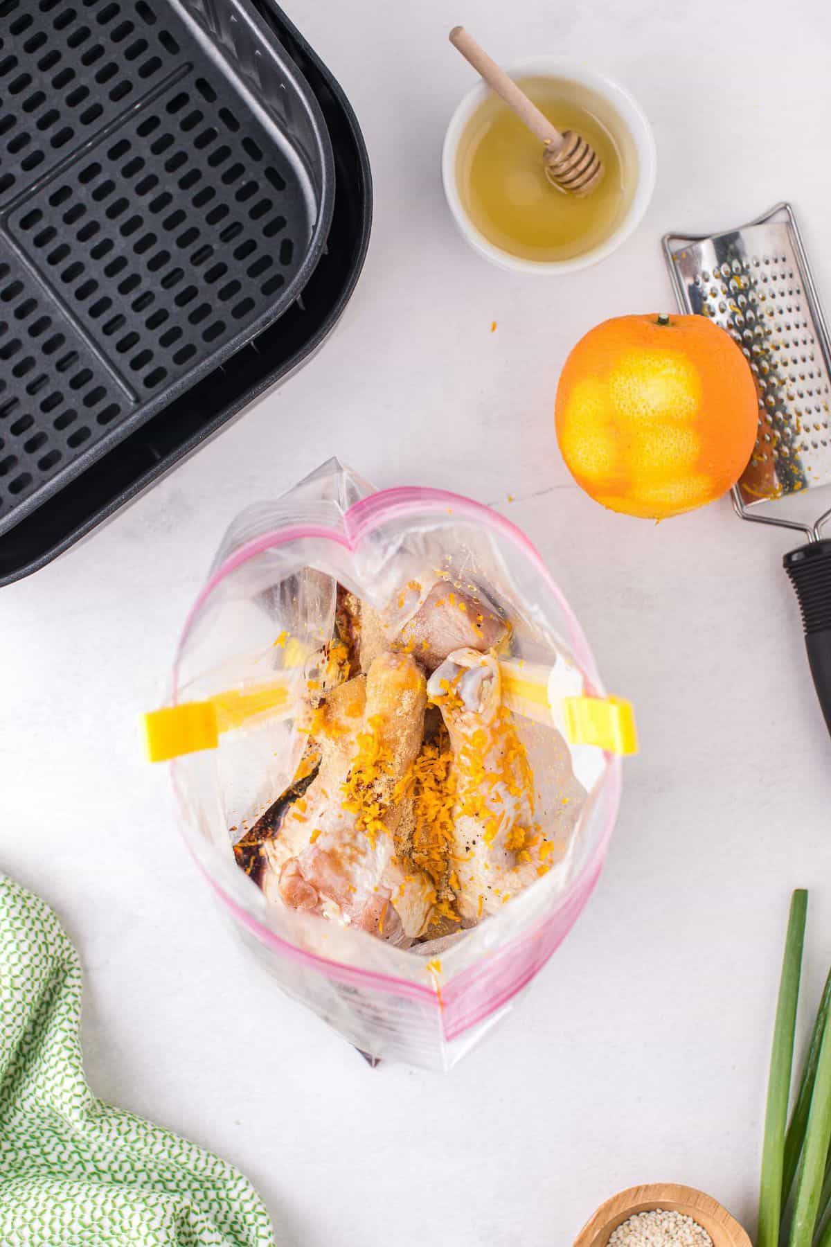 marinate chicken in the large ziploc bag