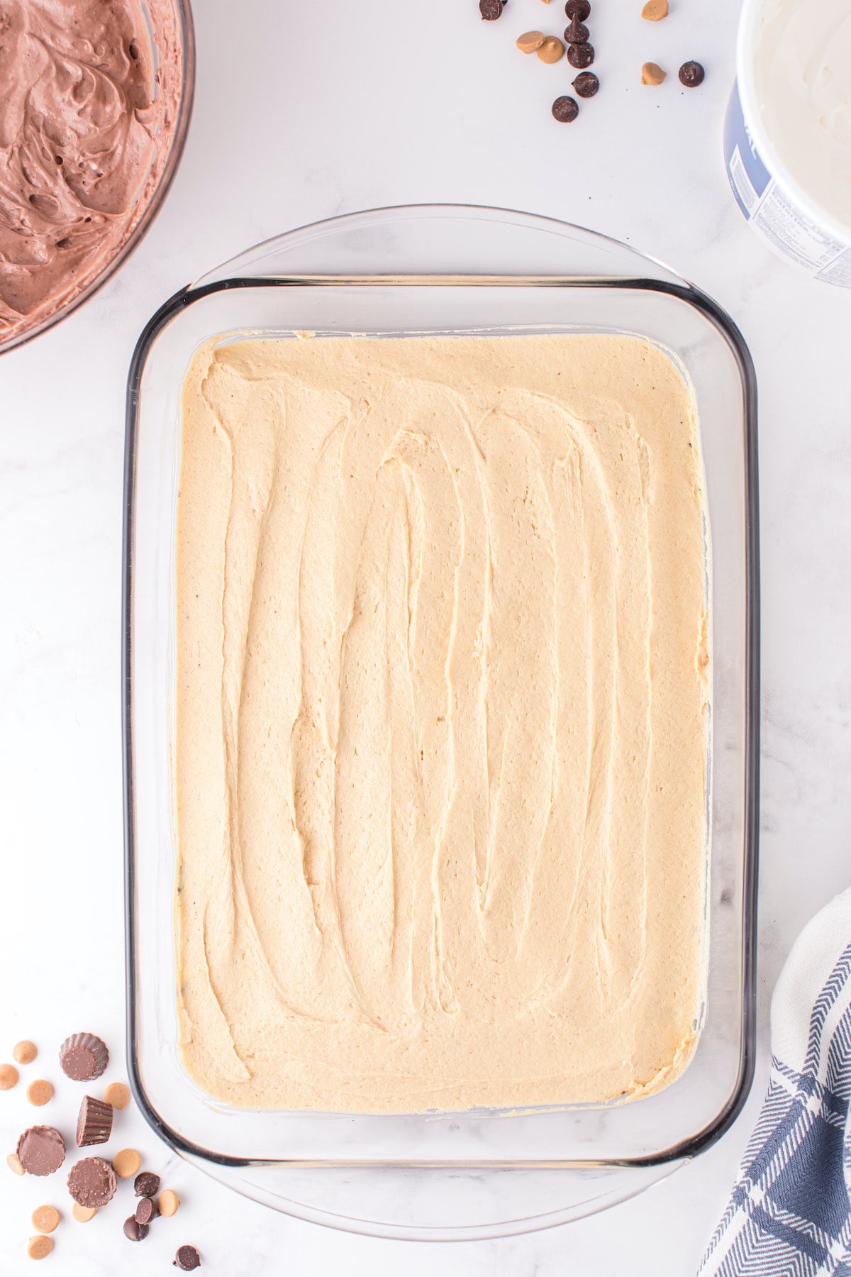pour peanut butter layer on top of the crust layer
