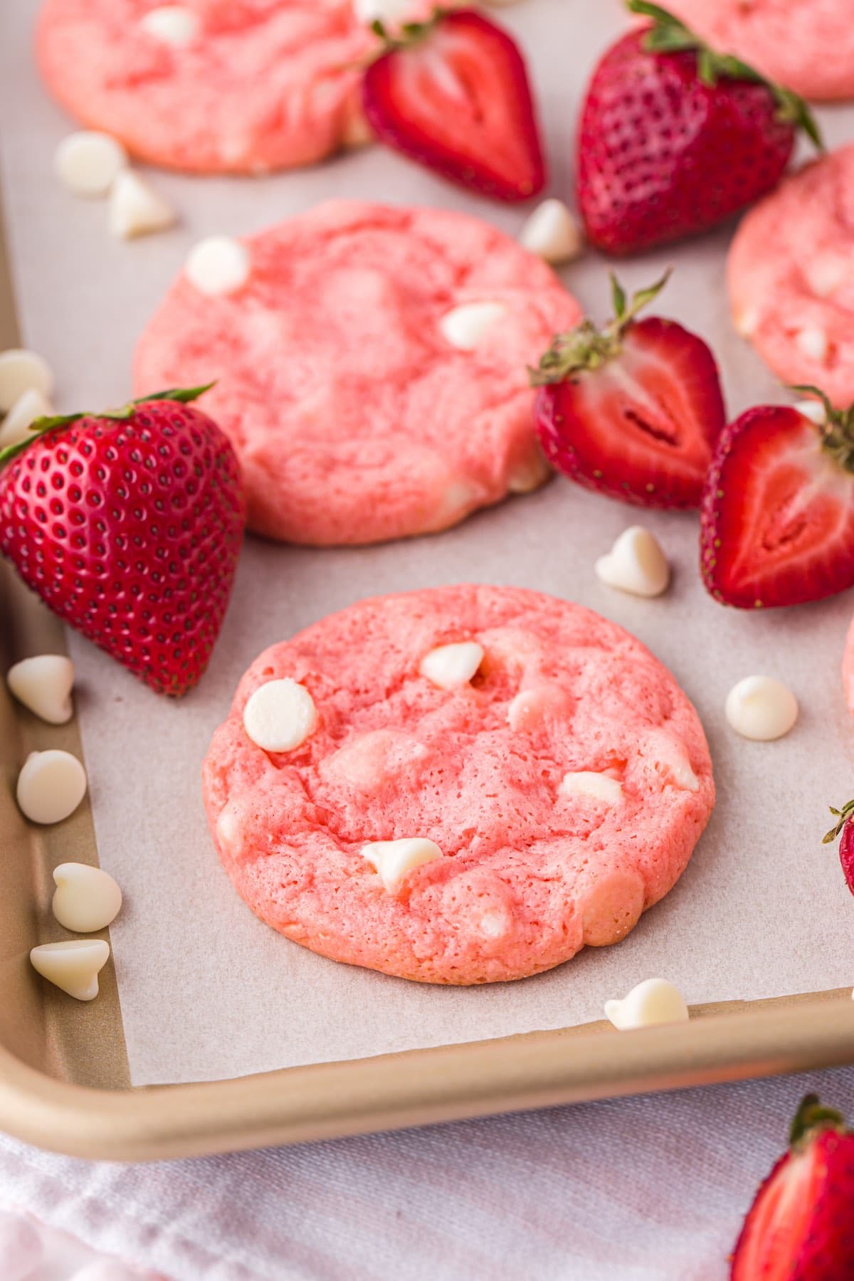 strawberry cake mix cookies on top of baking tray