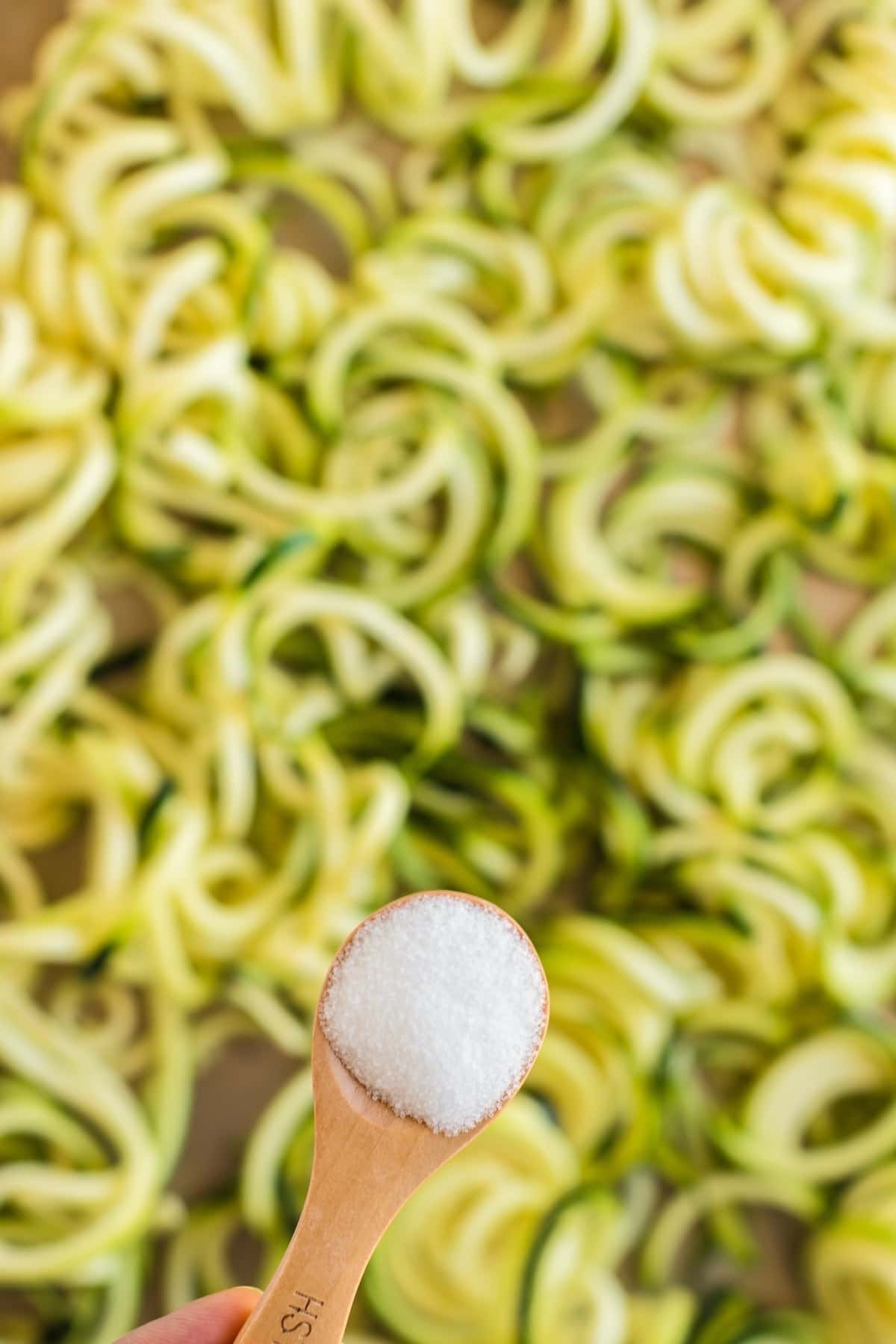add salt to the spiral zucchini