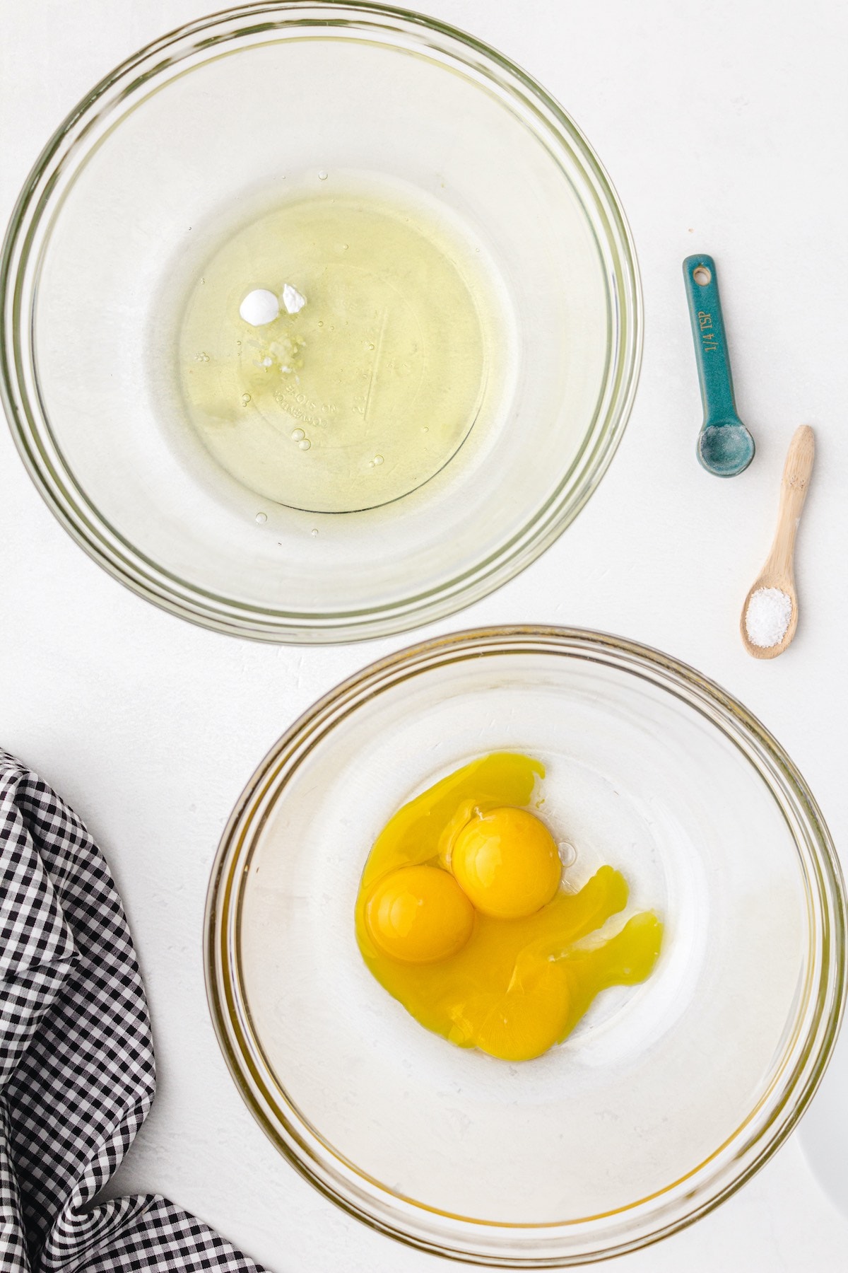 separate eggs into 2 glass bowl