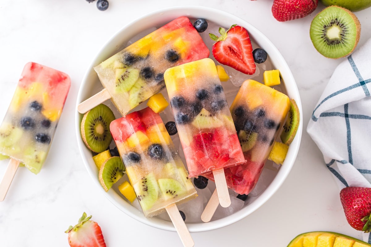 fruit popsicles in a bowl