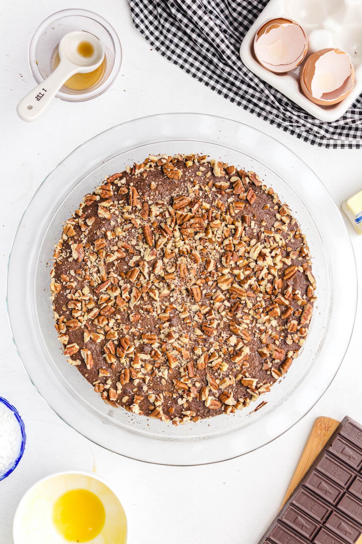 spread pecans on top of the brownie layer