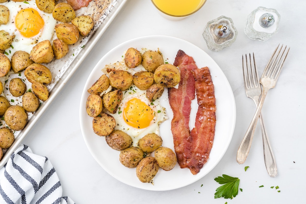 egg, potatoes, bacon on a plate