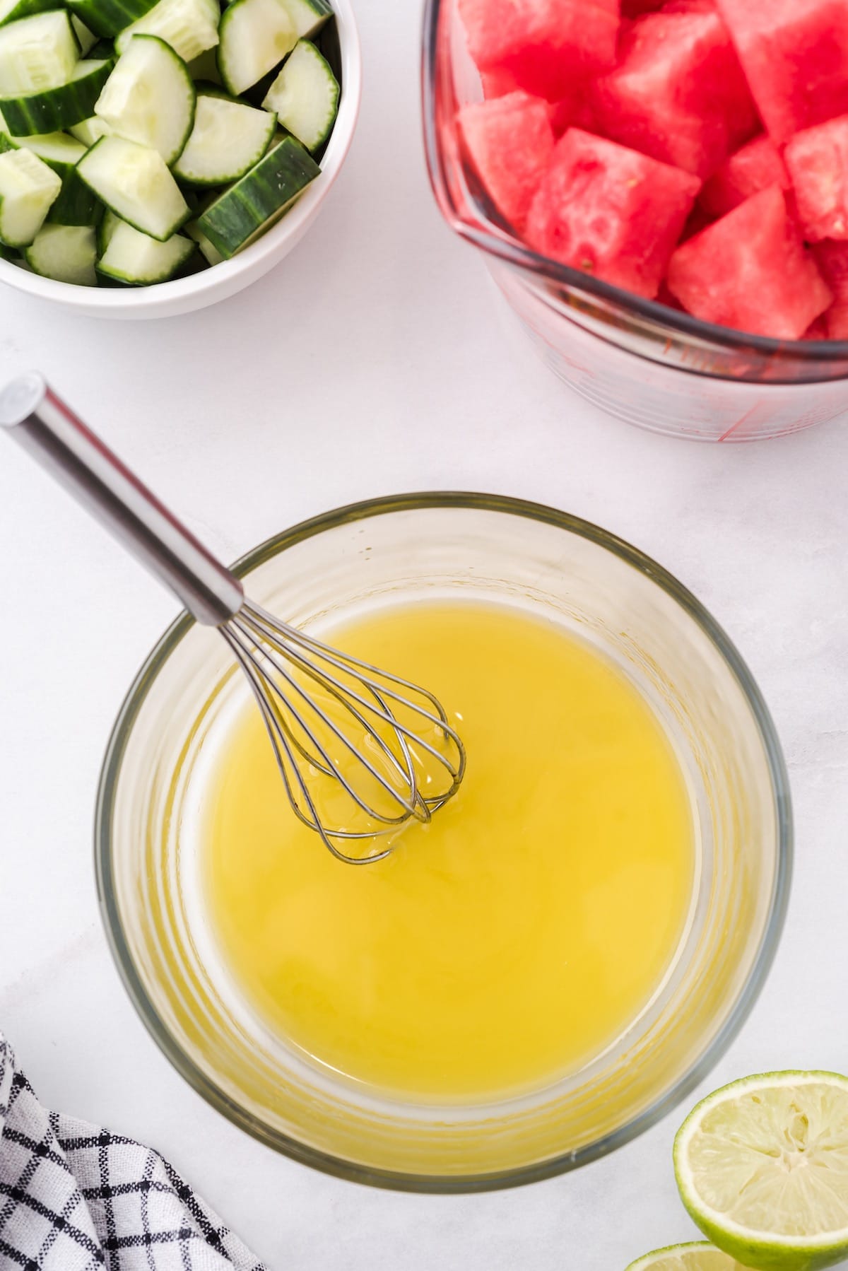 whisk together the olive oil and lime juice in a bowl
