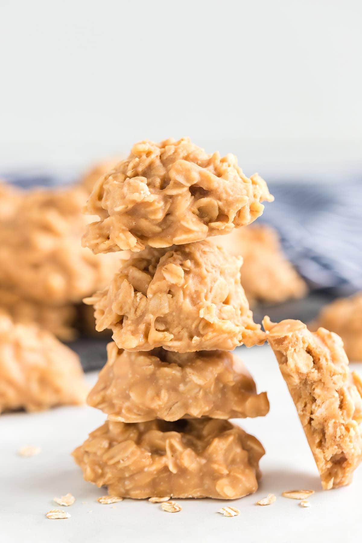 a stack of peanut butter no bake cookies on the table.