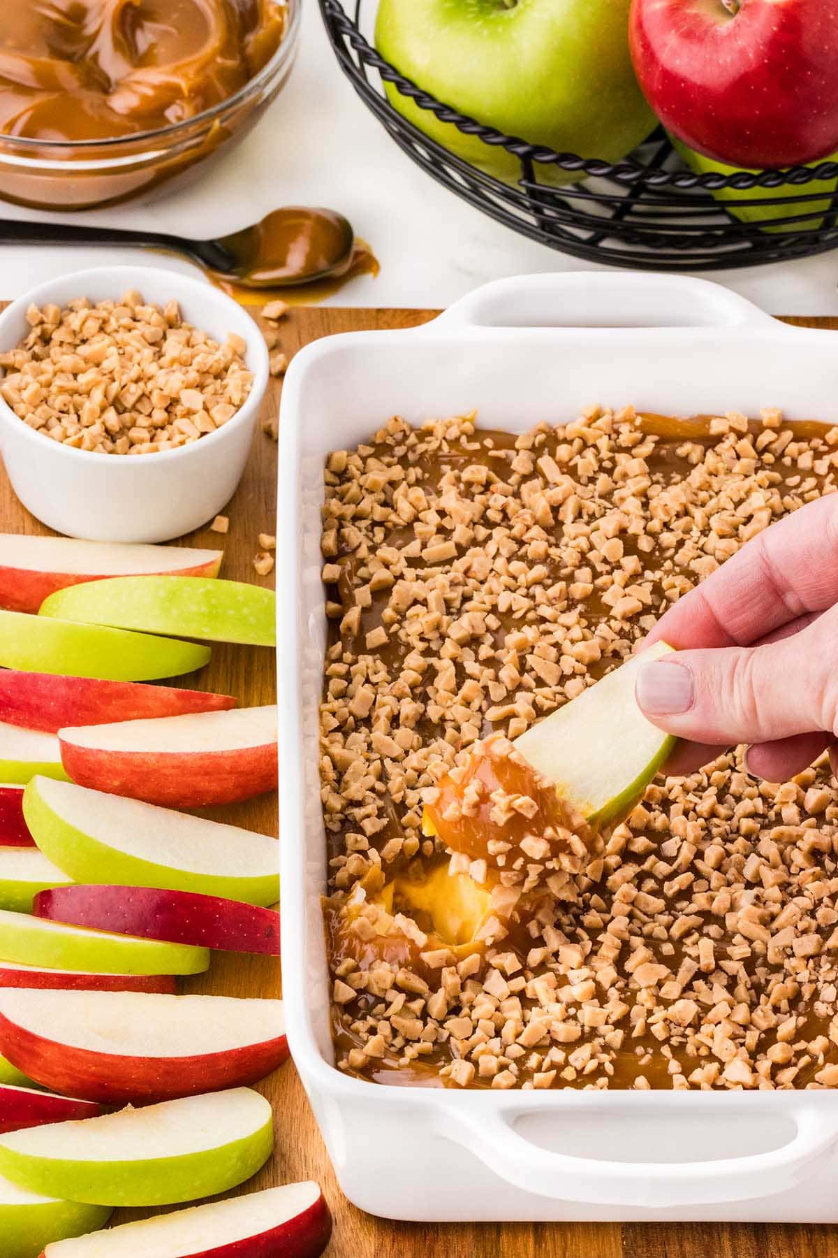 dipping apple slices into the dip. 