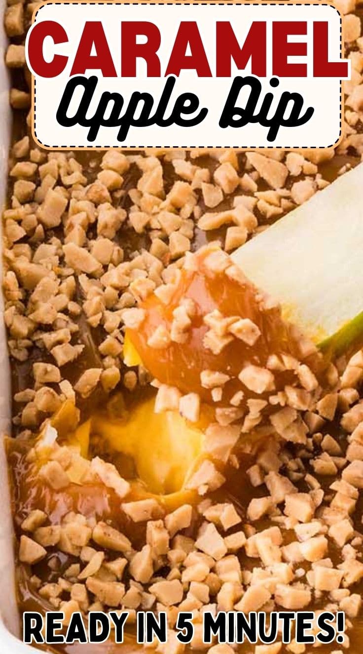 A slice of green apple dipped into caramel apple dip