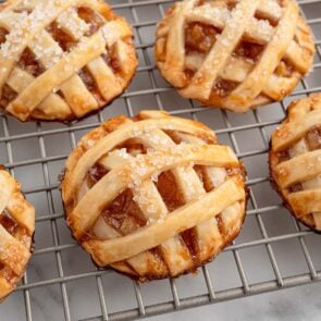 apple pie cookies on top of cooling rack.