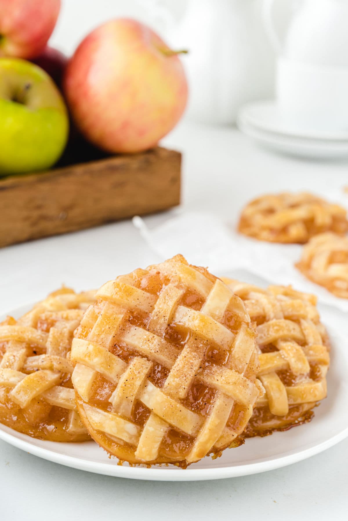 apple pie cookies on a white plate
