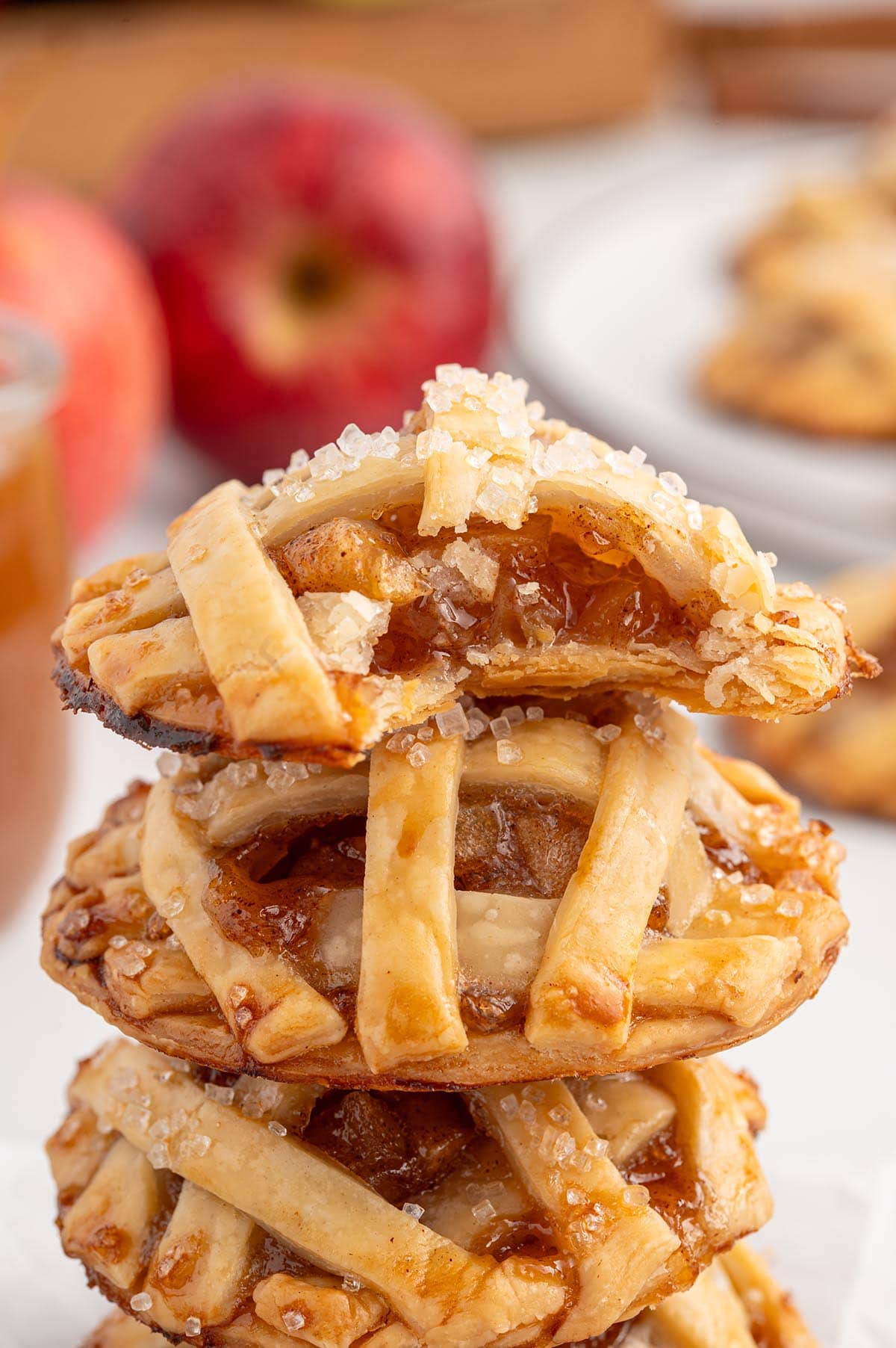 a stack of apple pie cookies on the table.