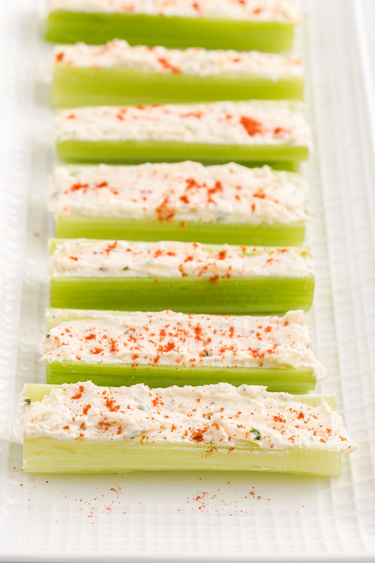 sprinkle paprika into celery