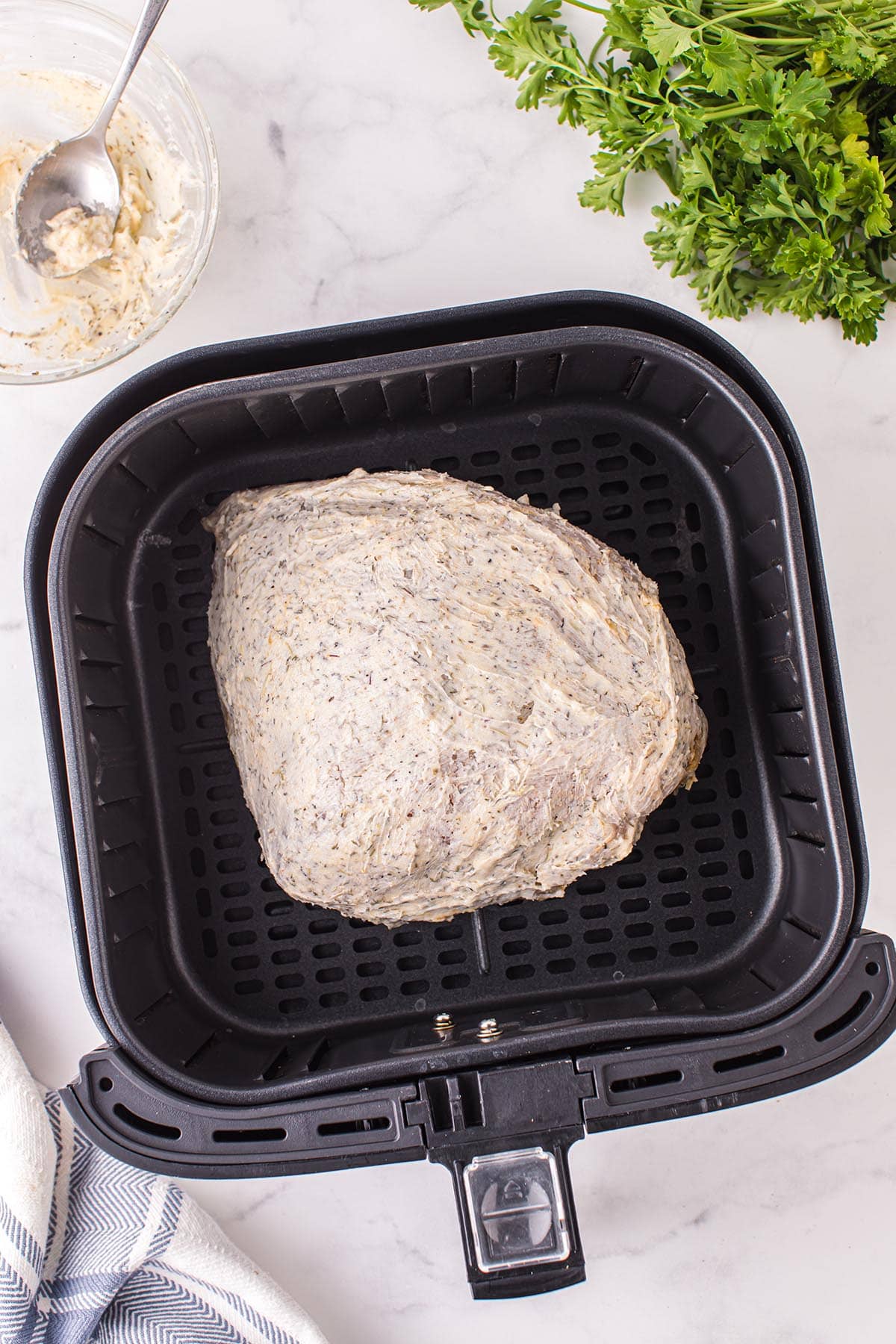 Generously coat the turkey breast with the seasoning mixture.