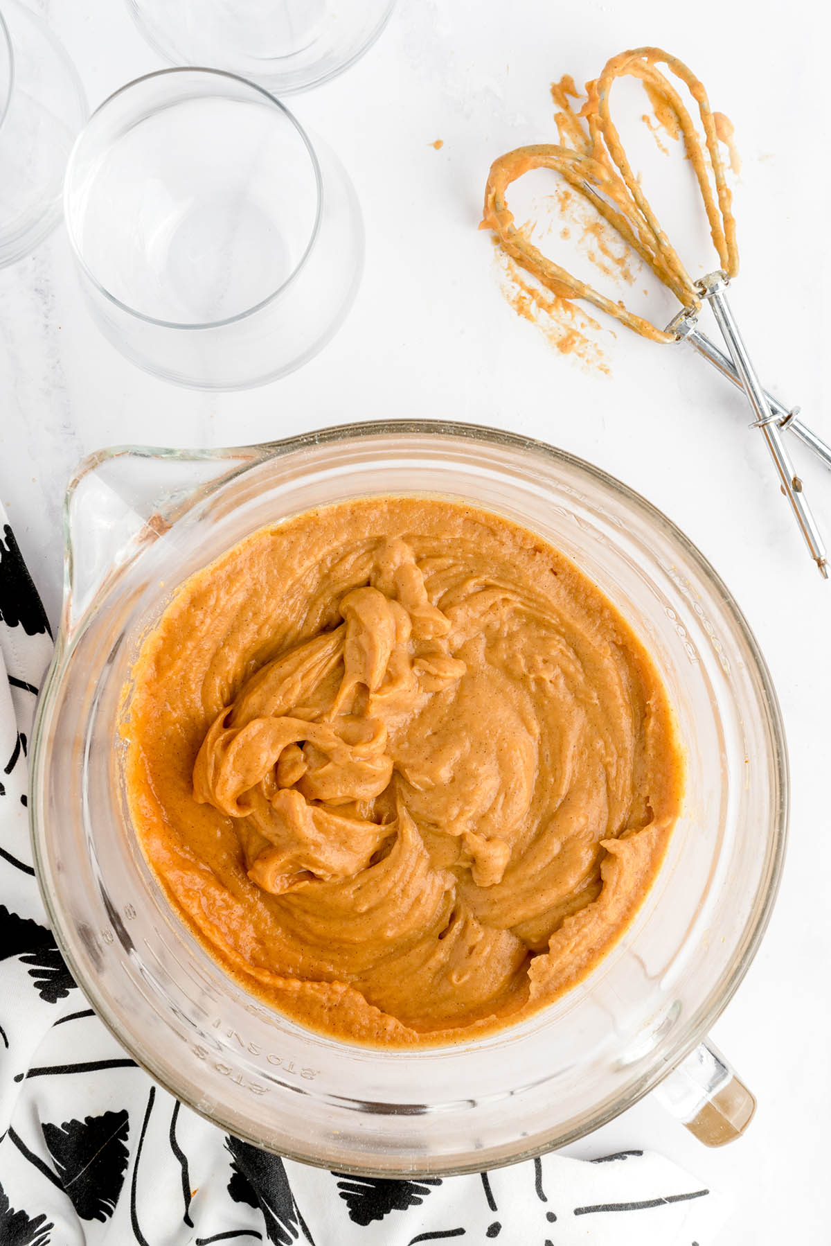 Beat together pumpkin puree, evaporated milk, pumpkin spice and instant pudding