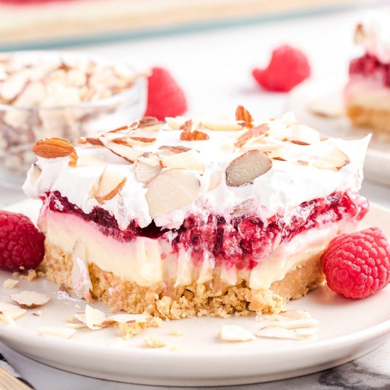 raspberry lasagna on a plate featured image