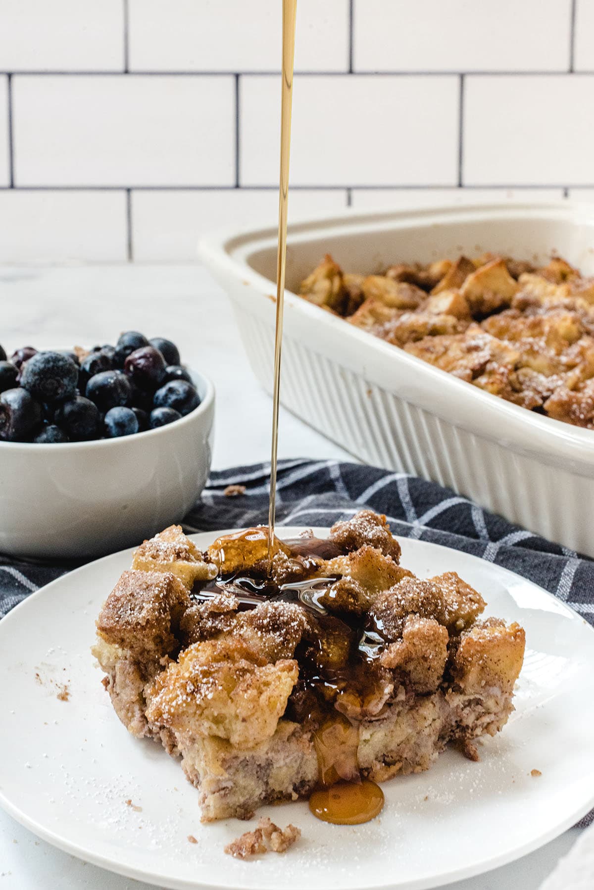 french toast casserole served with maple syrup