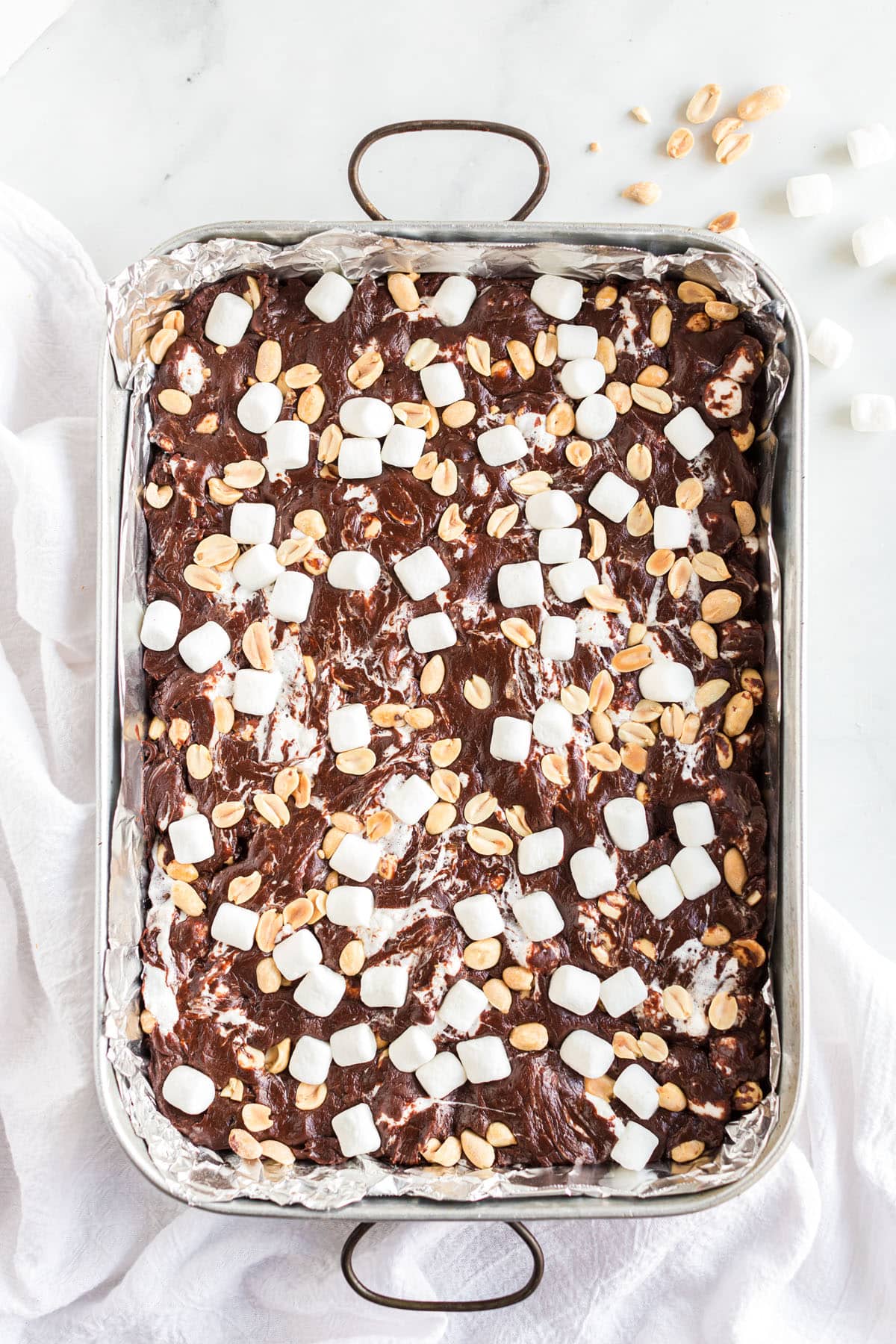 sprinkle additional marshmallow and peanuts on top