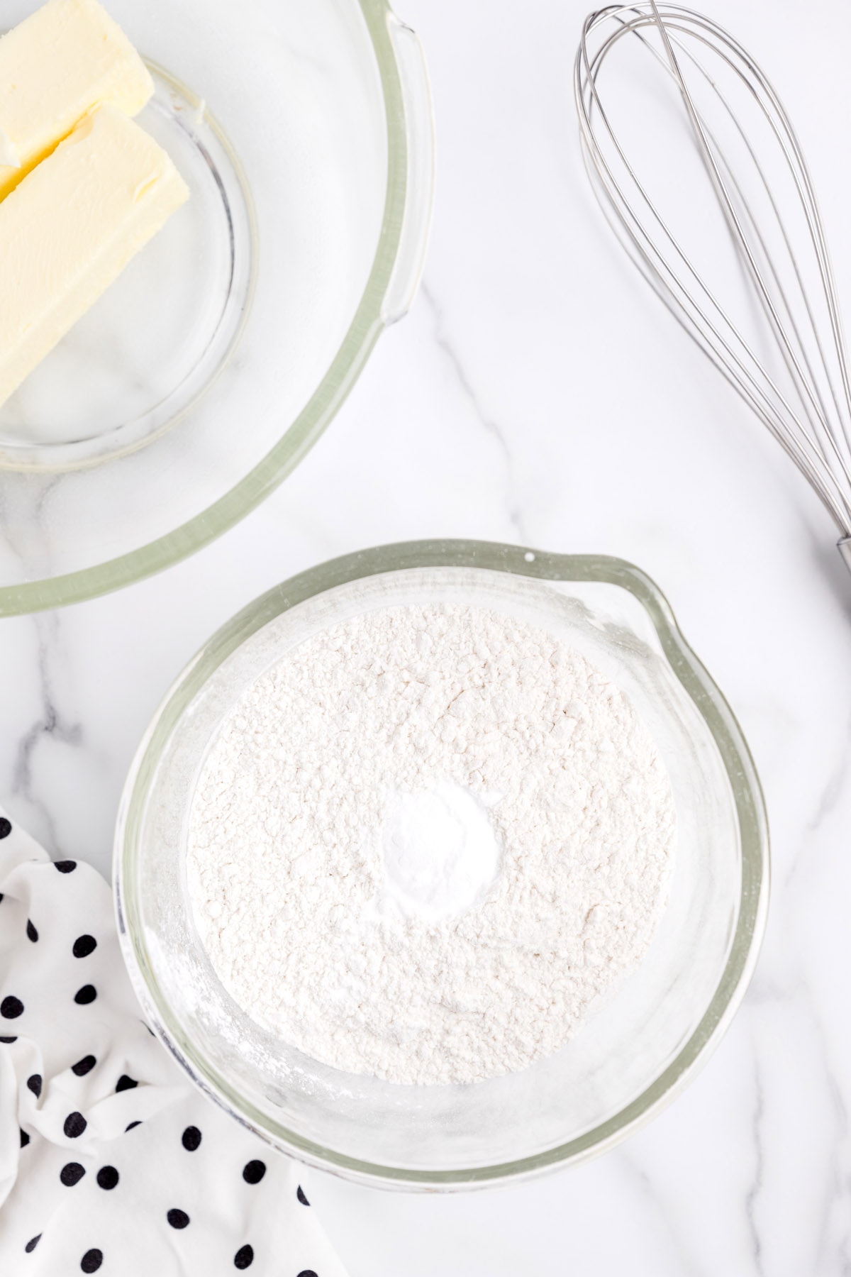Whisk together all-purpose flour and baking soda