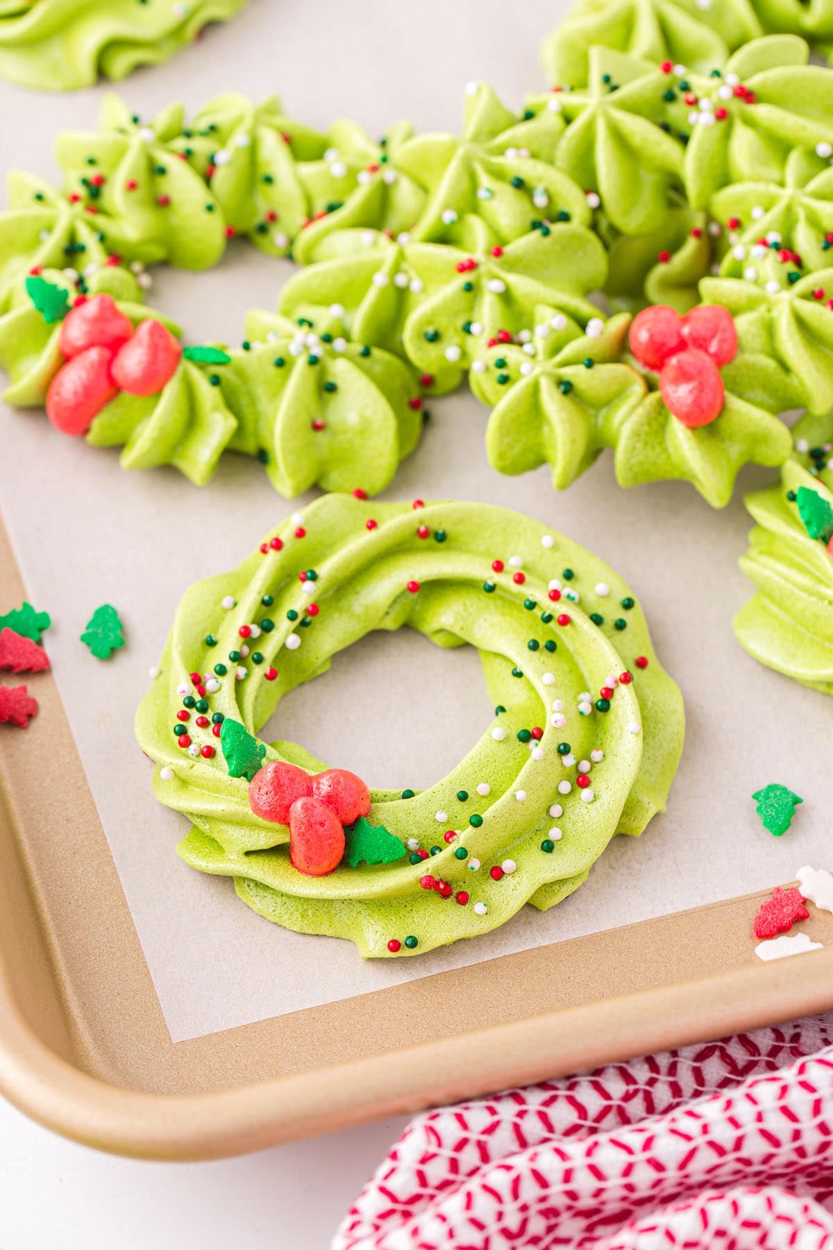 meringue wreath cookies on baking sheet
