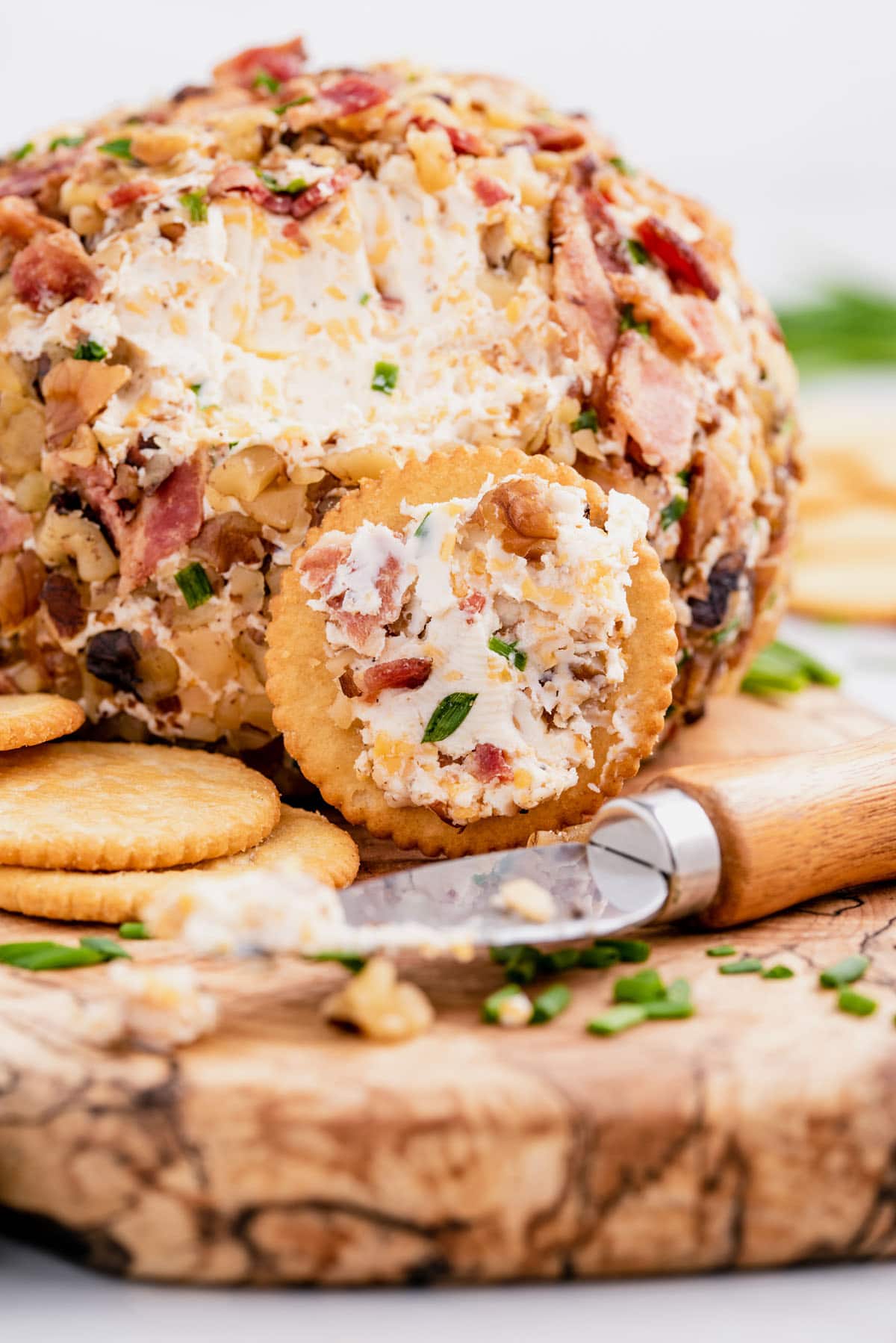 bacon cheddar ranch cheese ball served with crackers