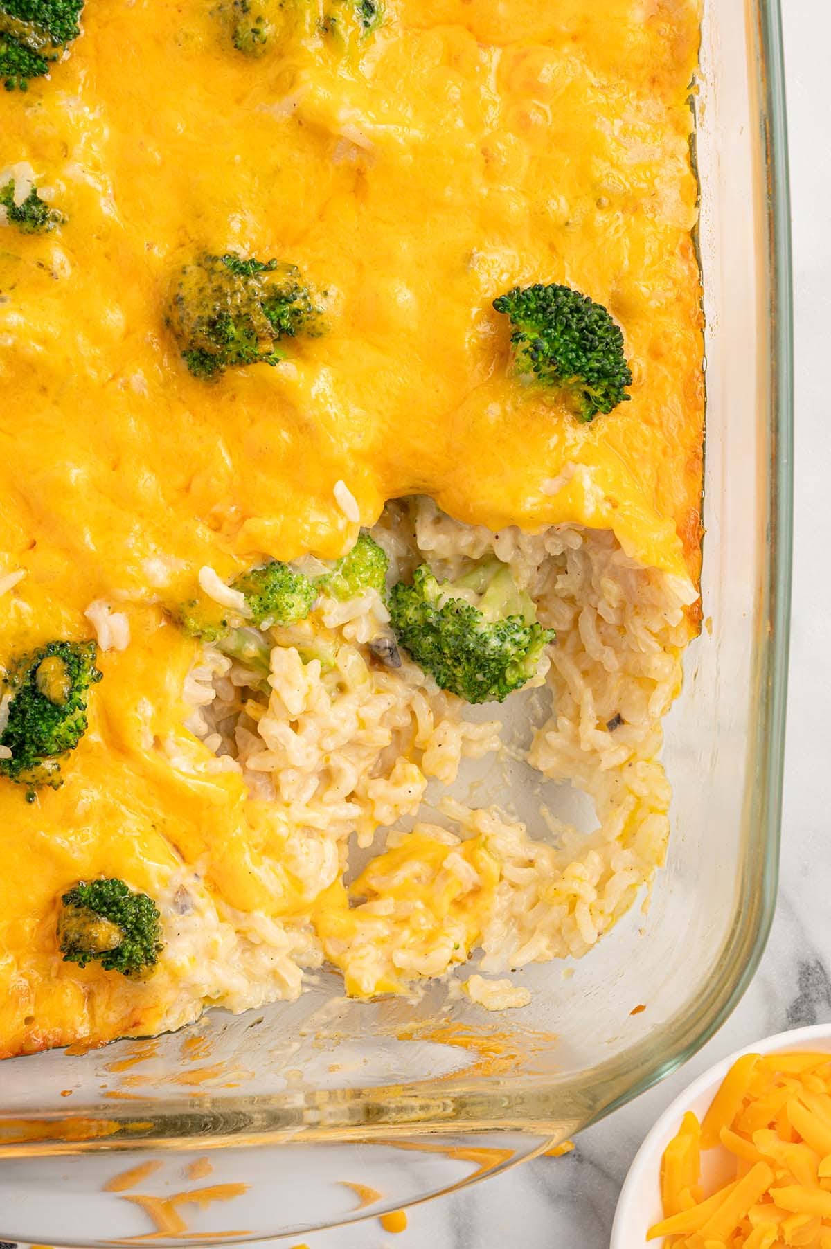 broccoli and rice casserole with melted cheese. 