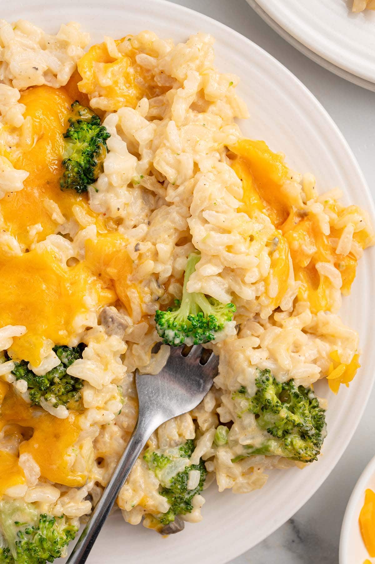 Broccoli and Rice Casserole on a white plate.