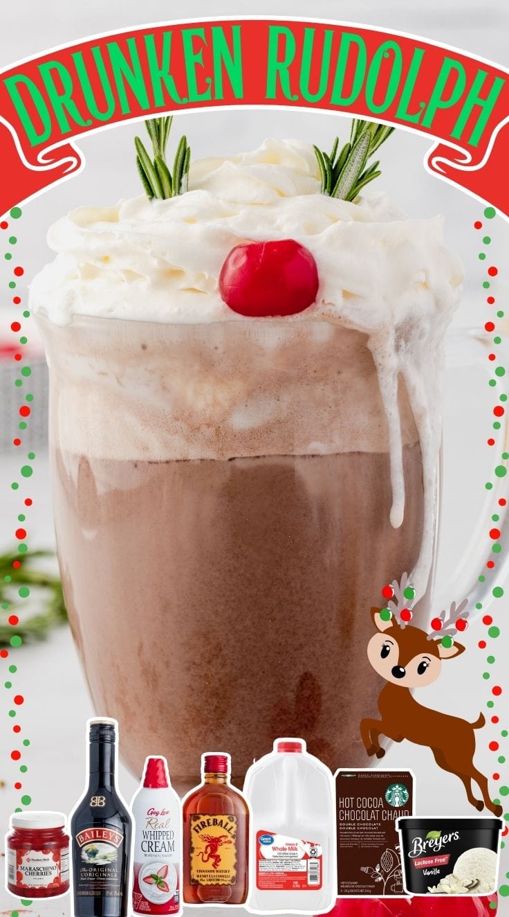 Glass of Drunken Rudolph drink topped with whipped cream, 2 sprigs of rosemary and red cherry