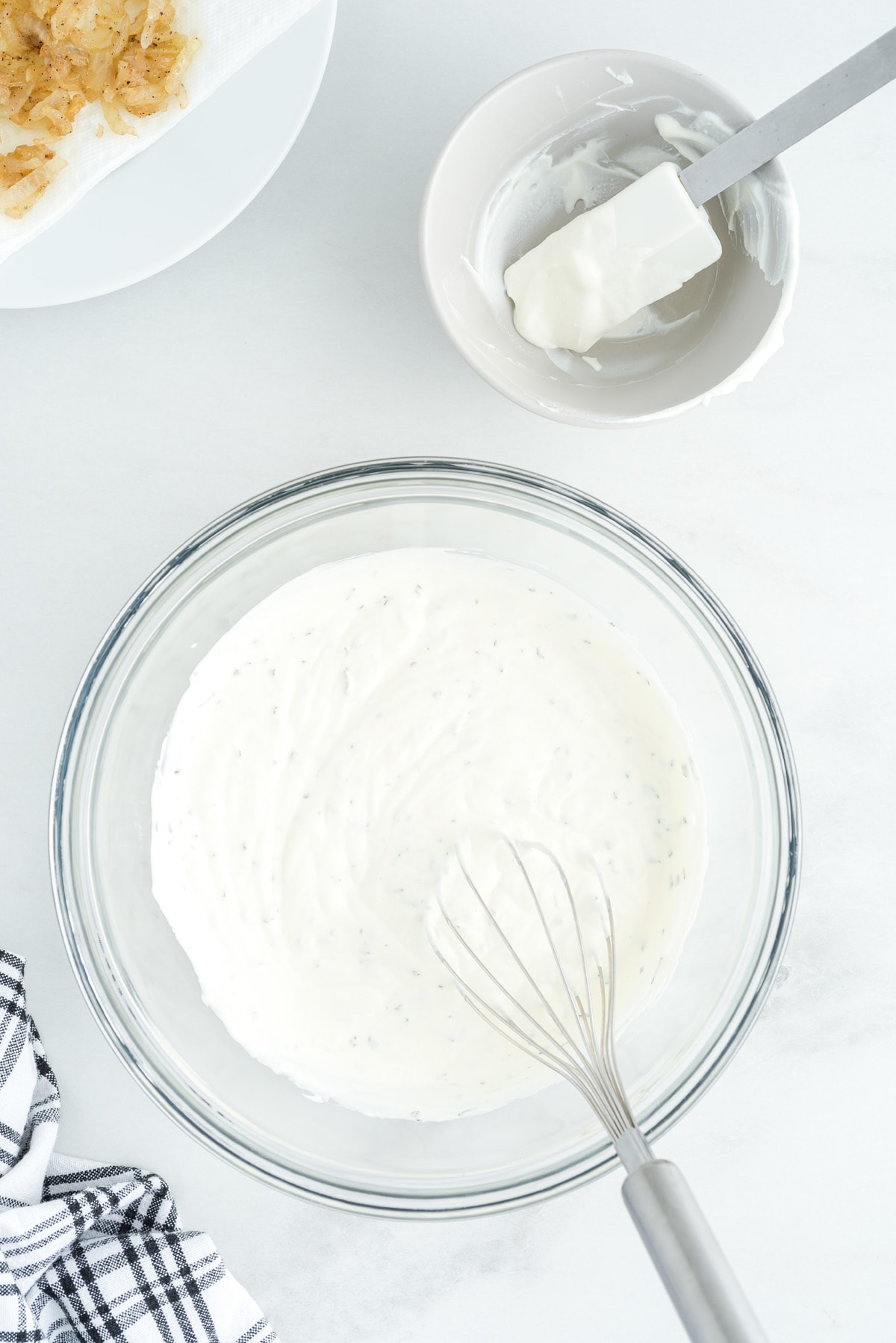 Whisk together sour cream, mayo, dried parsley, and onion powder