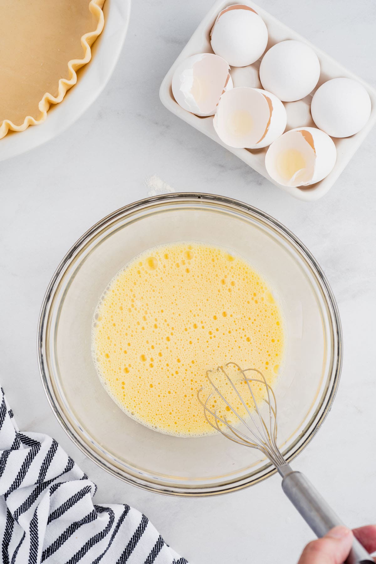 whisk eggs in a bowl