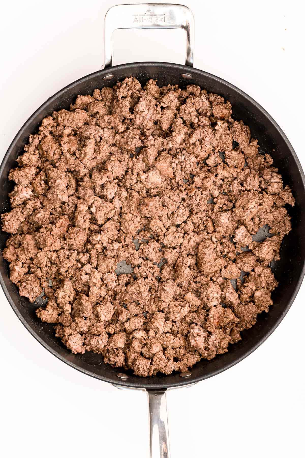 Brown ground beef in a skillet