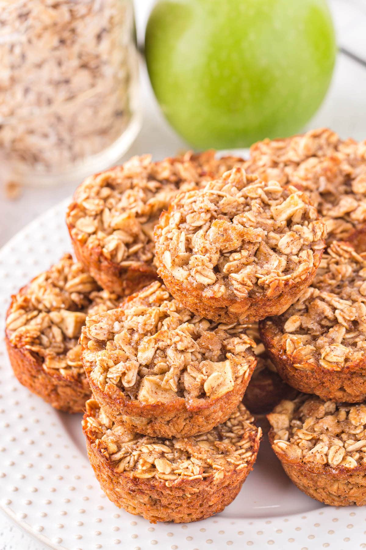 Cinnamon Apple Baked Oatmeal Cups on a white plate