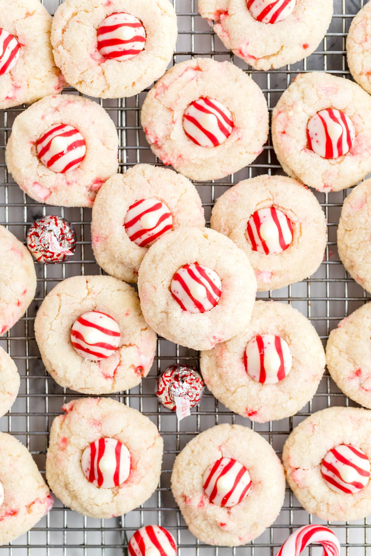 candy cane kiss cookies on drying rack