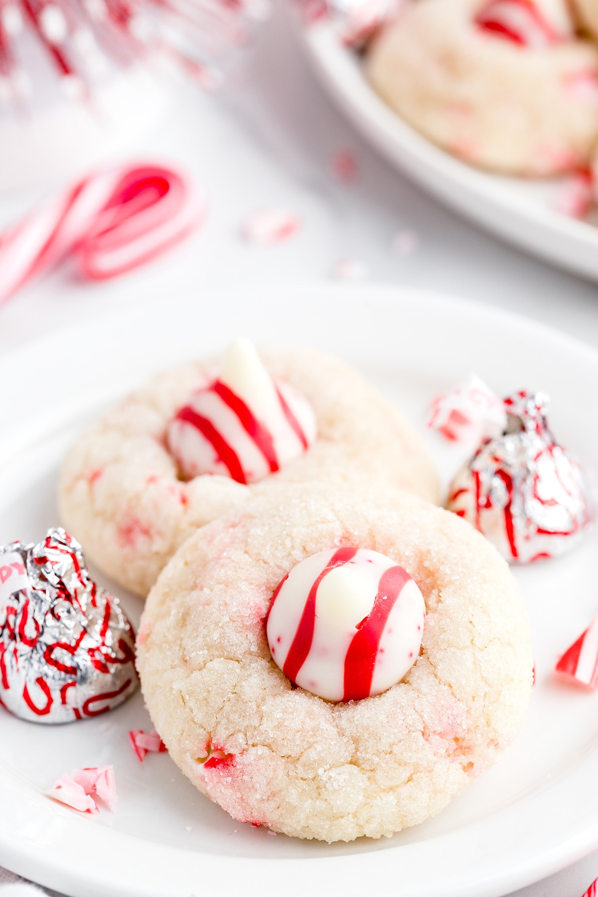 candy cane kiss cookies on a plate