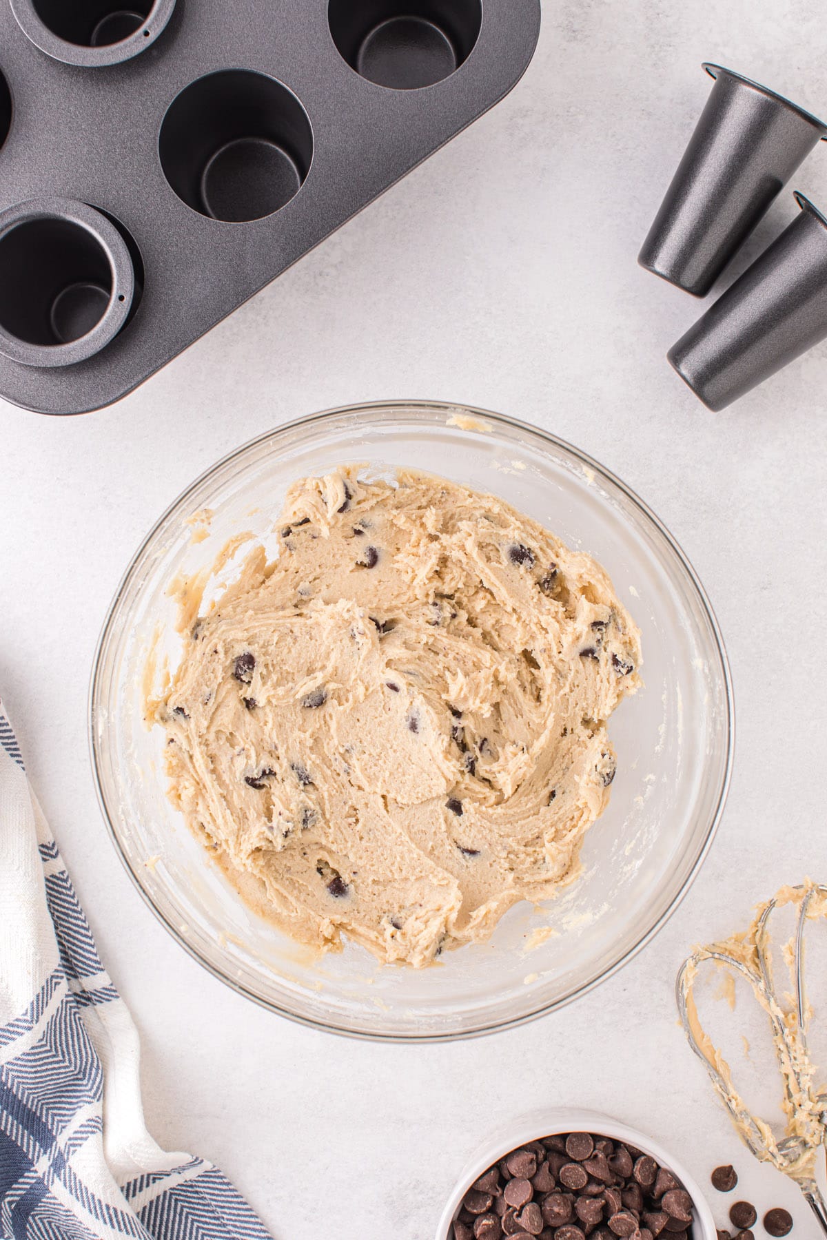 Mix together the cookie mix, butter, and egg to make chocolate chip cookie shooters