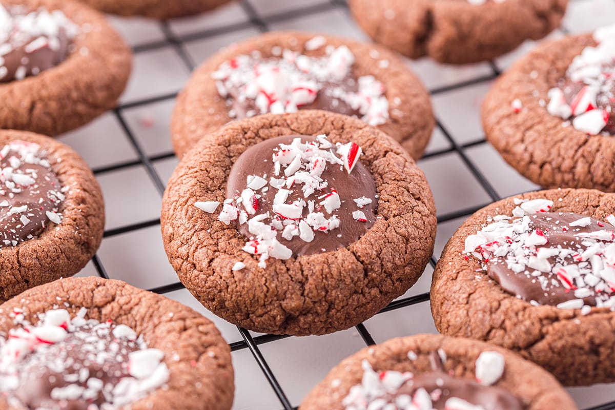 peppermint thumbprint cookies on drying rack