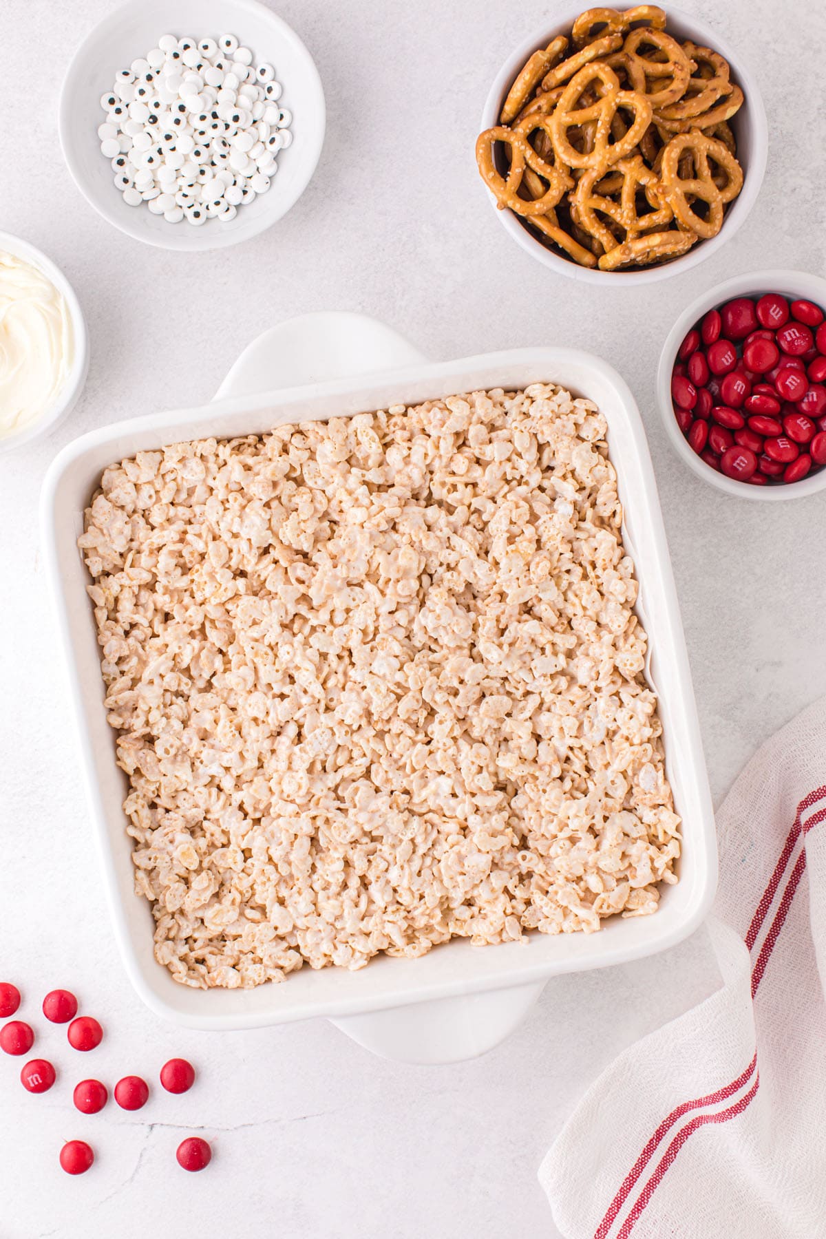 Spread the Rice Krispies treats into the bottom of the baking pan